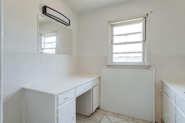 bathroom featuring tile walls and tile patterned floors