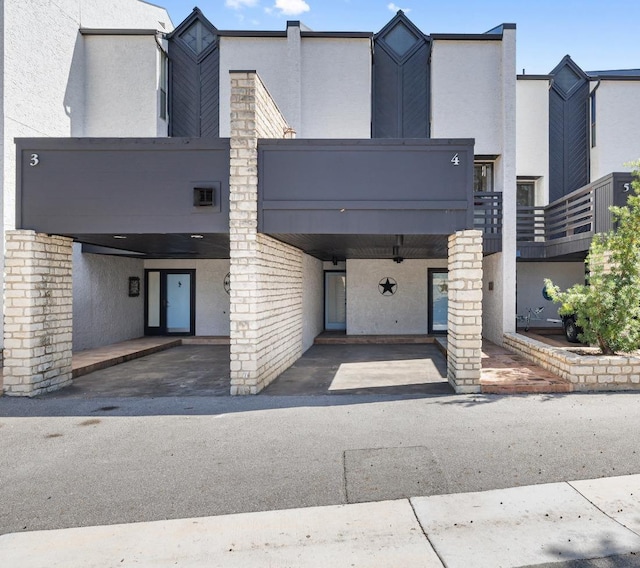 view of front of house with a carport