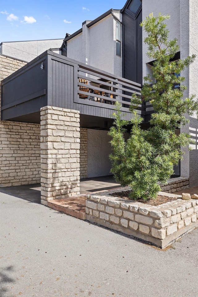 exterior space with a balcony