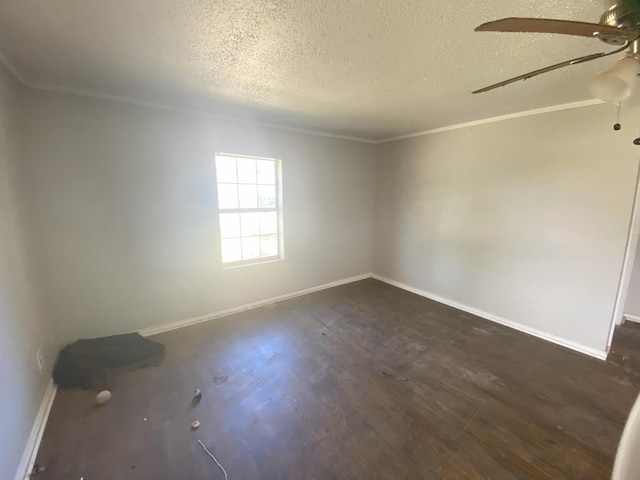 unfurnished room with ceiling fan, dark wood-type flooring, crown molding, and a textured ceiling