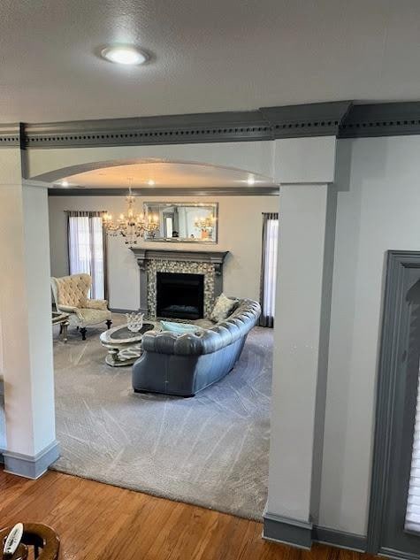 living room featuring hardwood / wood-style flooring and a chandelier