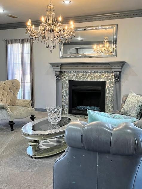 carpeted living room with crown molding and a fireplace