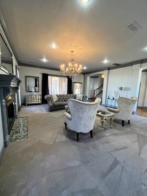 carpeted dining area featuring crown molding and a chandelier