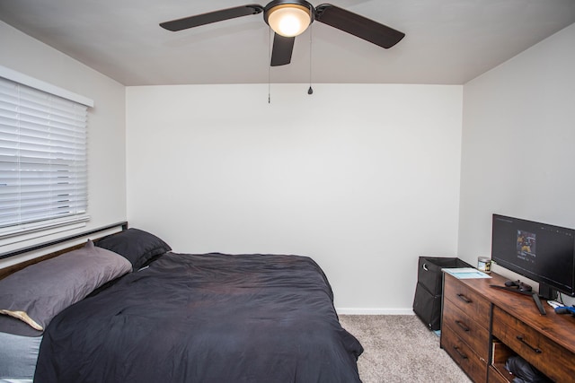 5303 46th St, Lubbock, TX 79414 - bedroom featuring baseboards, ceiling fan, and light colored carpet