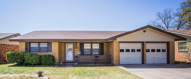 5303 46th St, Lubbock, TX 79414 - single story home with a front yard, a shingled roof, an attached garage, concrete driveway, and brick siding