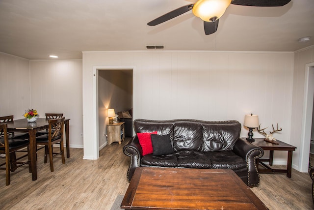 5303 46th St, Lubbock, TX 79414 - living area featuring visible vents, ceiling fan, and wood finished floors