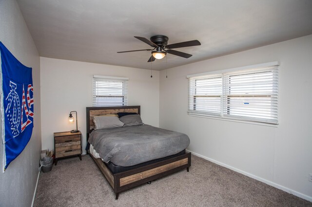5303 46th St, Lubbock, TX 79414 - carpeted bedroom with baseboards and a ceiling fan