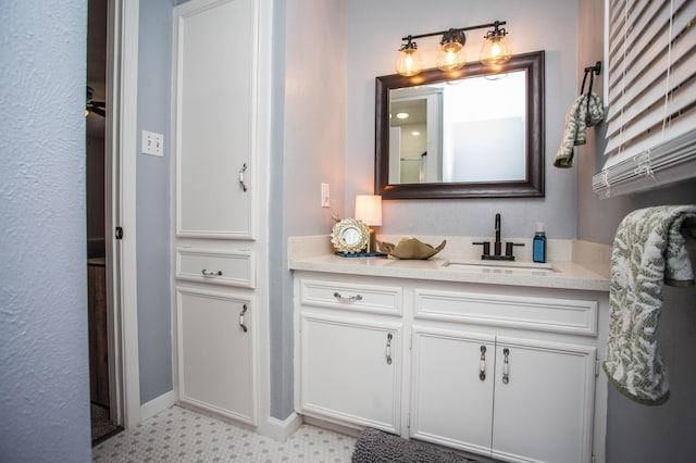 5303 46th St, Lubbock, TX 79414 - bathroom featuring vanity and baseboards
