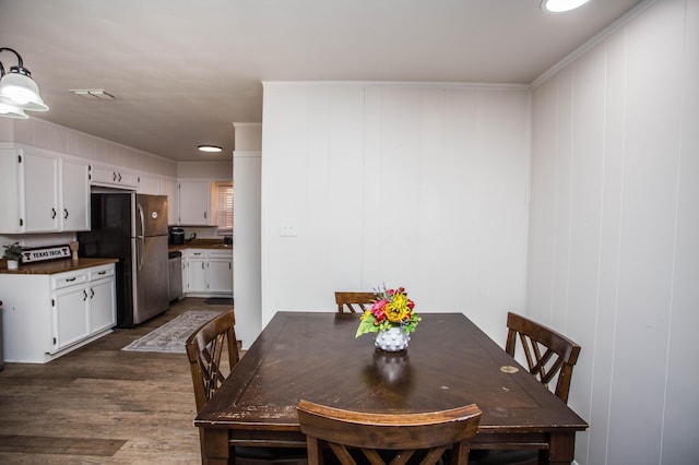 5303 46th St, Lubbock, TX 79414 - dining room featuring dark wood-style floors and visible vents