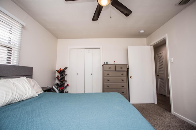 5303 46th St, Lubbock, TX 79414 - bedroom with visible vents, a ceiling fan, a closet, and carpet floors