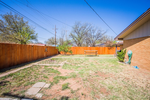 5303 46th St, Lubbock, TX 79414 - view of yard featuring a fenced backyard