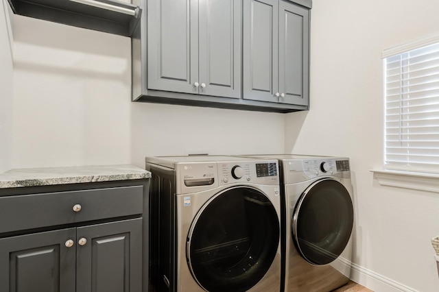 3621 121st St, Lubbock, TX 79423 - laundry area with cabinet space and washing machine and clothes dryer