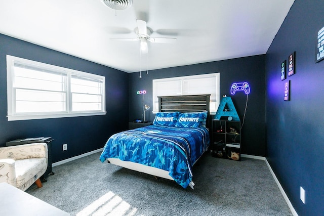 carpeted bedroom with ceiling fan