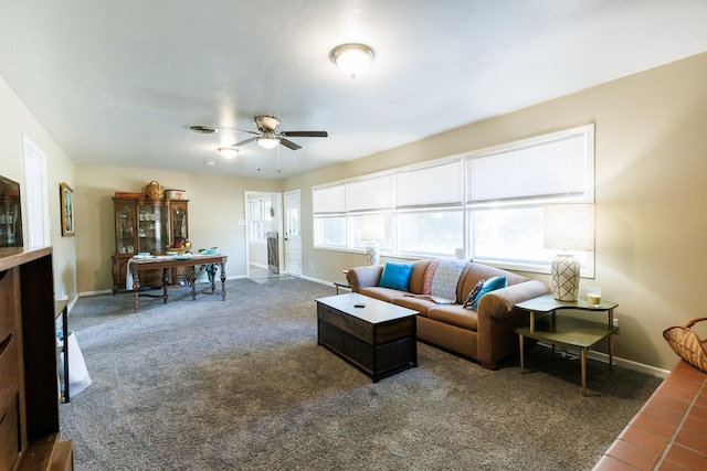 carpeted living room featuring ceiling fan