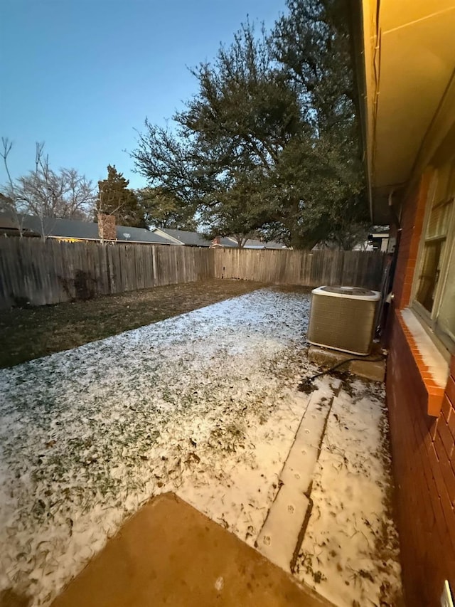 view of yard with central air condition unit