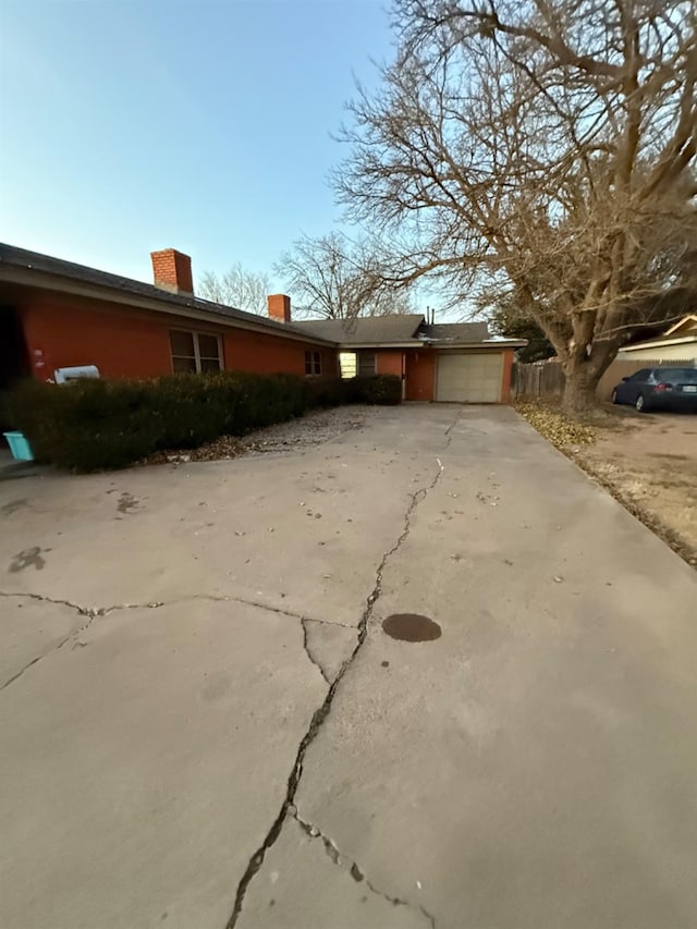 view of home's exterior featuring a garage