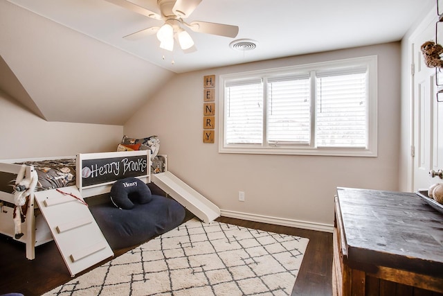 bedroom featuring wood-type flooring, vaulted ceiling, and ceiling fan