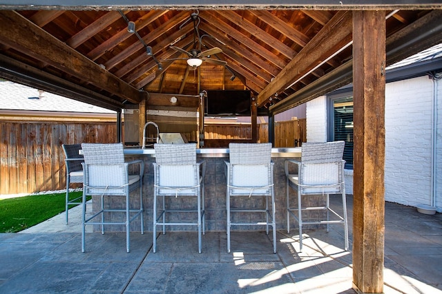 view of patio / terrace featuring a gazebo, an outdoor bar, and ceiling fan