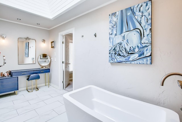 bathroom with crown molding, tile patterned floors, and a bathtub