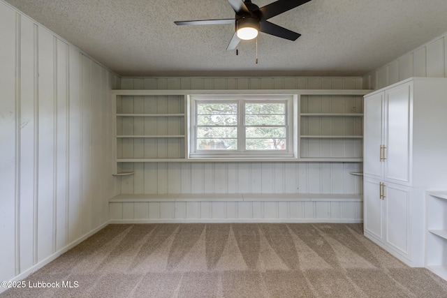 4013 48th St, Lubbock, TX 79413 - carpeted empty room featuring a textured ceiling and ceiling fan