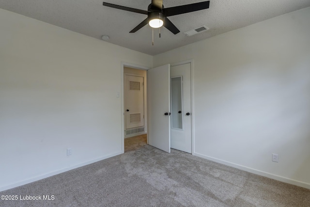 4013 48th St, Lubbock, TX 79413 - carpeted spare room featuring a ceiling fan and baseboards