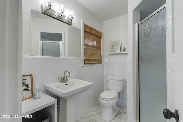 4013 48th St, Lubbock, TX 79413 - bathroom featuring marble look tile flooring, tile walls, and a stall shower