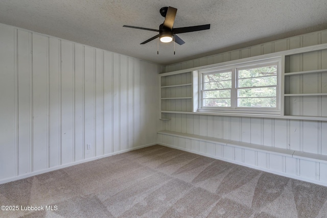 4013 48th St, Lubbock, TX 79413 - carpeted empty room featuring a textured ceiling and ceiling fan