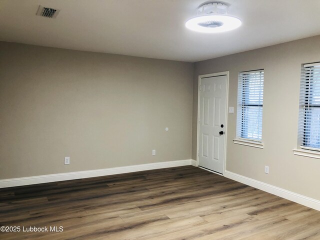 5712 73rd St, Lubbock, TX 79424 - entrance foyer with wood finished floors and baseboards