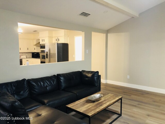 5712 73rd St, Lubbock, TX 79424 - living room featuring wood finished floors and baseboards