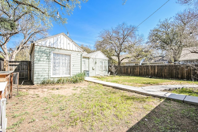 3123 22nd St, Lubbock, TX 79410 - view of yard with a fenced backyard and an outbuilding