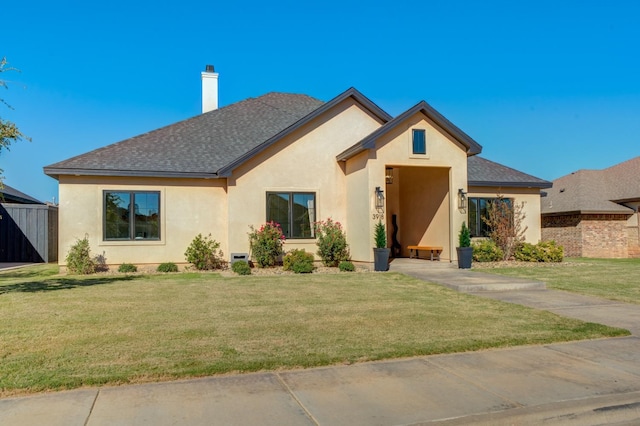 view of front facade featuring a front lawn