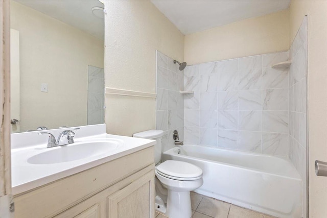 full bathroom with tile patterned flooring, vanity, toilet, and tiled shower / bath