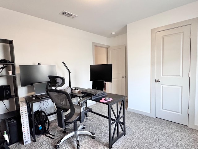 view of carpeted office space