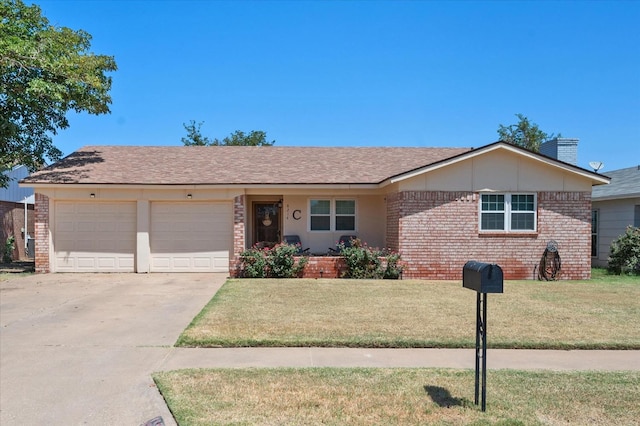 ranch-style house with a garage and a front yard