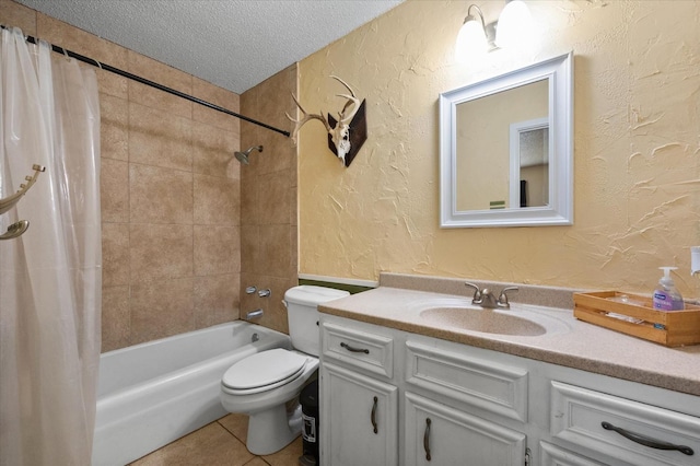 full bathroom featuring toilet, a textured ceiling, vanity, shower / bath combination with curtain, and tile patterned flooring