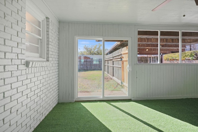 5217 45th St, Lubbock, TX 79414 - unfurnished sunroom with a ceiling fan