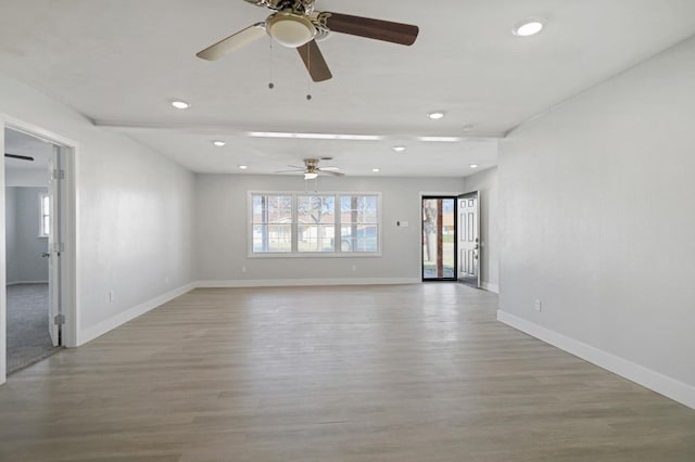 5217 45th St, Lubbock, TX 79414 - unfurnished room featuring ceiling fan, wood finished floors, baseboards, and recessed lighting