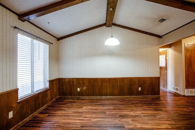8206 Louisville Ave, Lubbock, TX 79423 - unfurnished room featuring wood finished floors, wood walls, a wainscoted wall, and crown molding