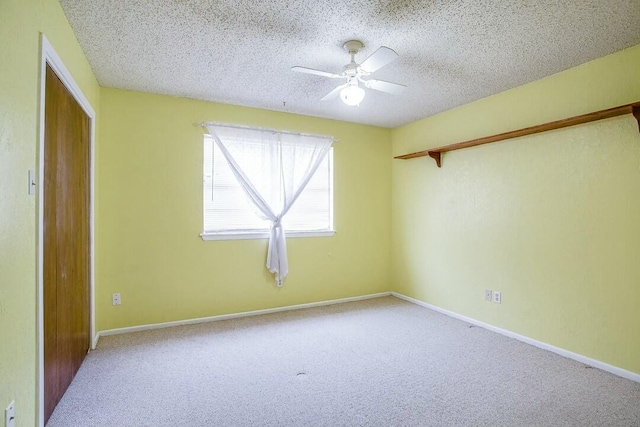 8206 Louisville Ave, Lubbock, TX 79423 - carpeted spare room featuring ceiling fan and a textured ceiling