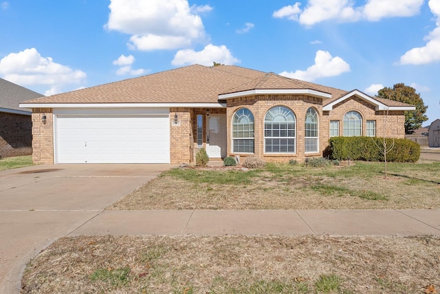 single story home featuring a garage