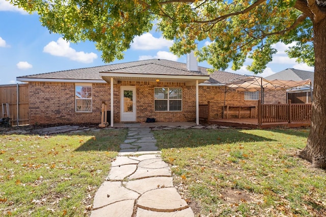 view of front of property with a front lawn