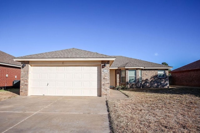 ranch-style house with a garage