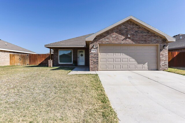 8812 16th St, Lubbock, TX 79416 - ranch-style house with driveway, a front yard, a garage, brick siding, and fence