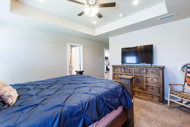 8812 16th St, Lubbock, TX 79416 - bedroom featuring carpet, a tray ceiling, recessed lighting, and visible vents