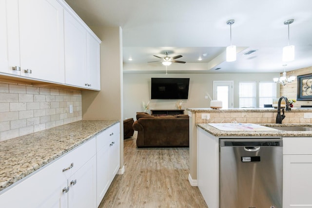 8812 16th St, Lubbock, TX 79416 - kitchen featuring decorative backsplash, visible vents, stainless steel dishwasher, a sink, and light wood-style floors