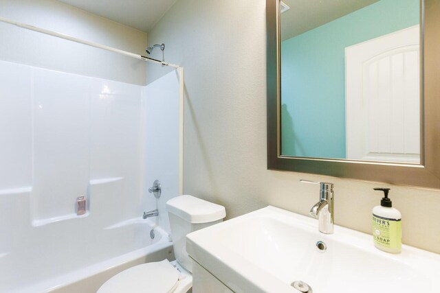 8812 16th St, Lubbock, TX 79416 - full bathroom featuring shower / bath combination, vanity, and toilet