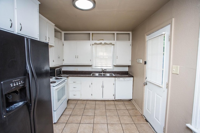 kitchen with sink, black appliances, white cabinets, and light tile patterned flooring