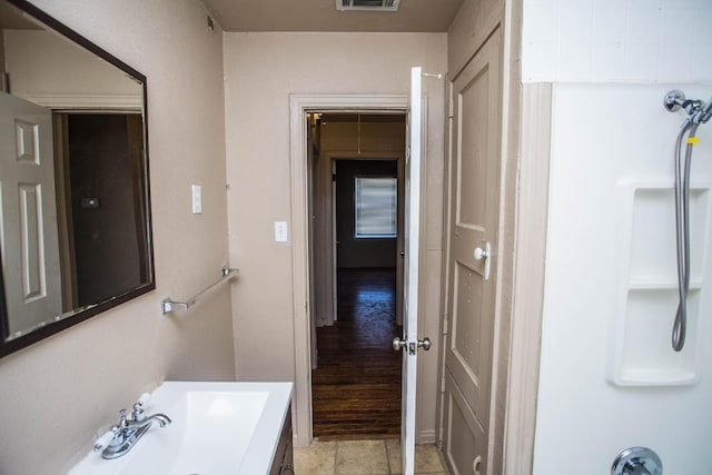 bathroom with a shower