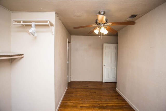 hall with dark wood-type flooring