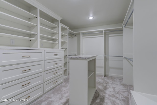 7726 46th St, Lubbock, TX 79407 - walk in closet featuring light carpet